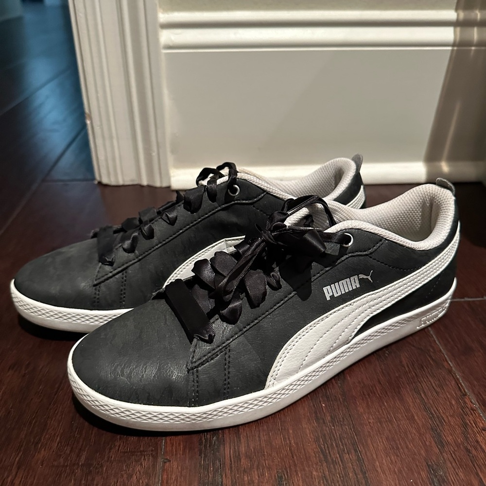 Puma women's Black and White Sneakers